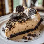 No-Bake Peanut Butter Oreo Pie topped with whipped cream