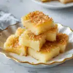 Hawaiian Butter Mochi golden squares on table