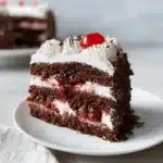 Black Forest Cake with whipped cream and cherries