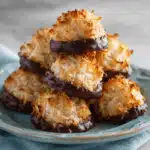 chocolate dipped coconut macaroons on plate