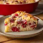 Crustless Cranberry Pie with Golden Edges and Fresh Cranberries
