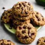 Zucchini oatmeal chocolate chip cookies cooling on rack